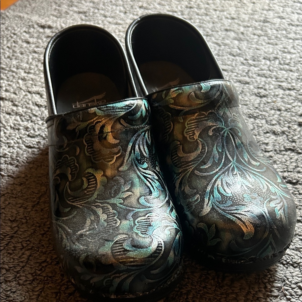 Dansko Black and Teal Patterned Clogs